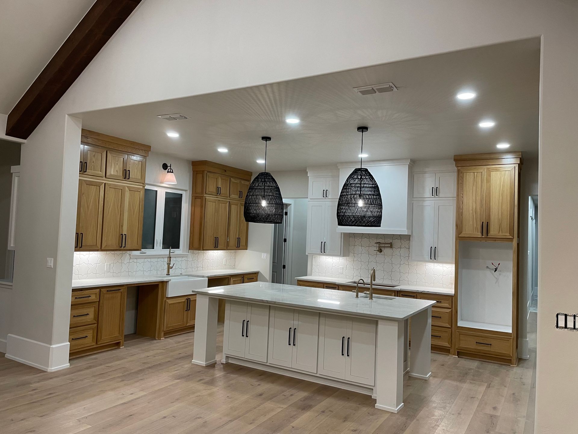 This kitchen turned out stylish with a warm open feel ! 